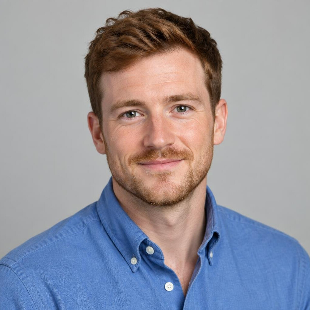 Portrait of a young man in a shirt smiling